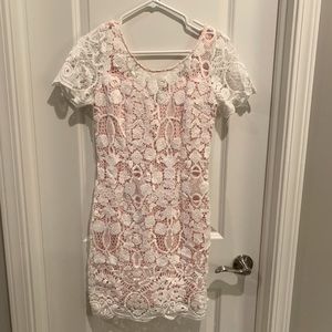 White dress with blush pink underlay